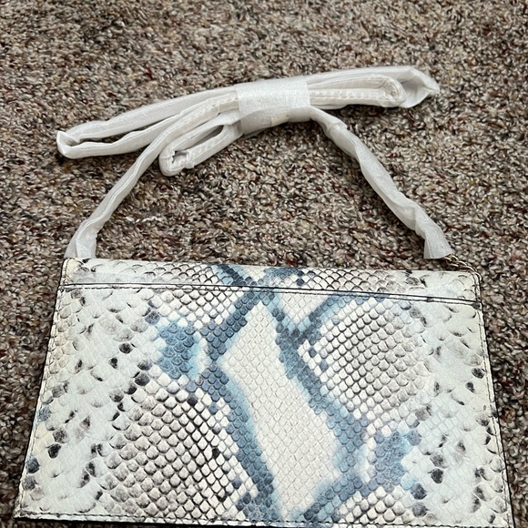 NWT Kate Spade Hayes Street
Snake-embossed Brennan
Crossbody Clutch - Picture 13 of 15